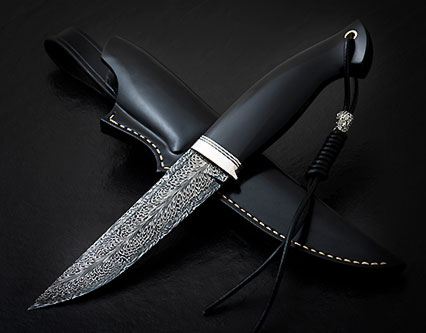 Damascus knife black handle